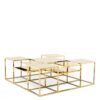 The glamorous Avian Coffee Table comprises a solid steel frame with gold finish.