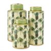 Split-leaf Philodendrons and pineapples make these Pineapple Jars delightful decorative objects.
