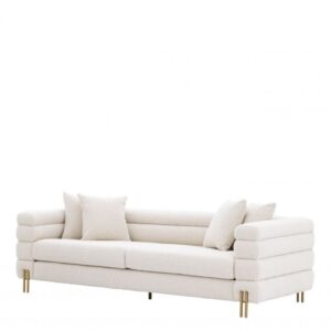 The fabulous bouclé cream York Sofa with brushed brass legs oozes a touch of decadence.
