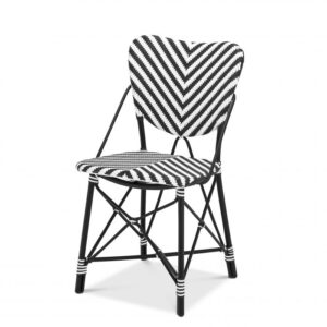 Spice up your dining room or lounge with the monochrome rattan Colony Chair.