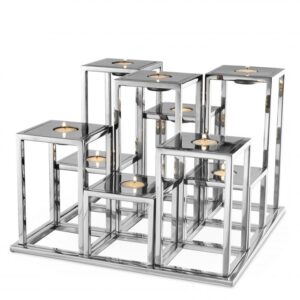 The nickel finished Castello Tealight Holder is stepped like a podium to create a multi-level configuration